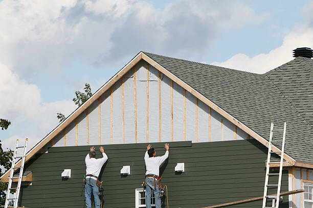 Professional Siding technician working in Concord, VA